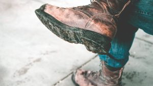 boots with a concrete background